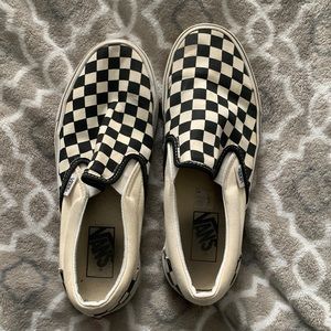 Checkered white and black vans